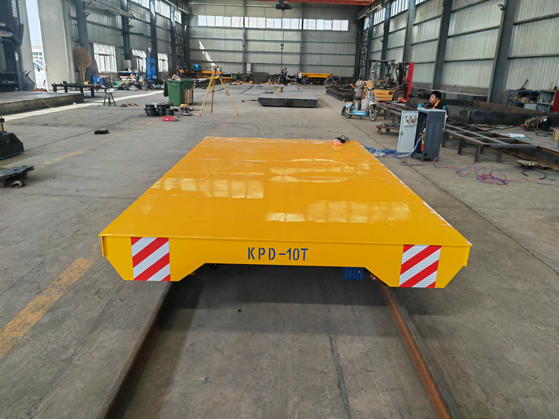 Teollisuuden kuljetusratkaisu Low Voltage Rail Transfer Trolley