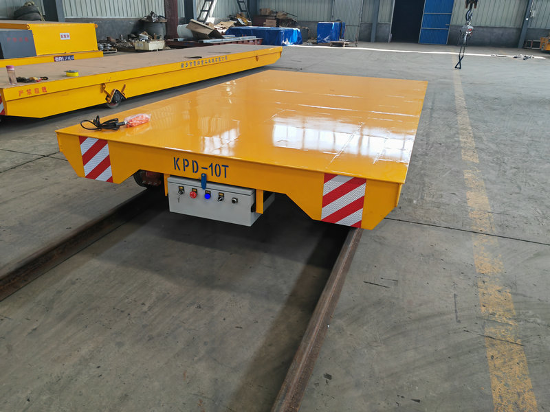 Teollisuuden kuljetusratkaisu Low Voltage Rail Transfer Trolley