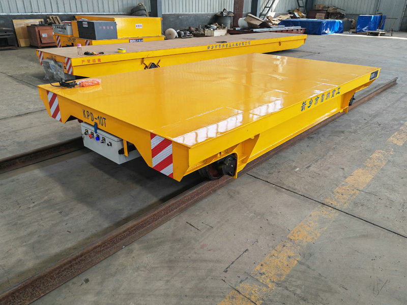 Teollisuuden kuljetusratkaisu Low Voltage Rail Transfer Trolley